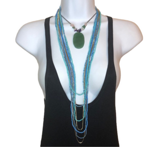 Curated bundle statement look necklaces Kenneth Cole + Artisan